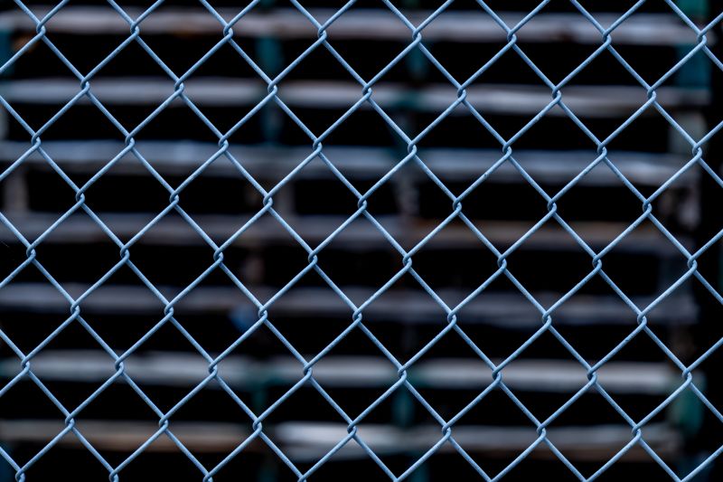 Finished Woven Wire Fence in a Commercial Setting